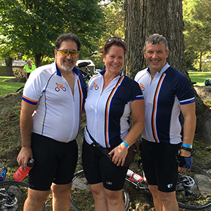 Employees participating in bicycling event